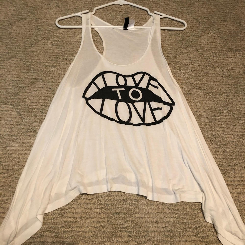 White tank with “Love to Love” logo in lips